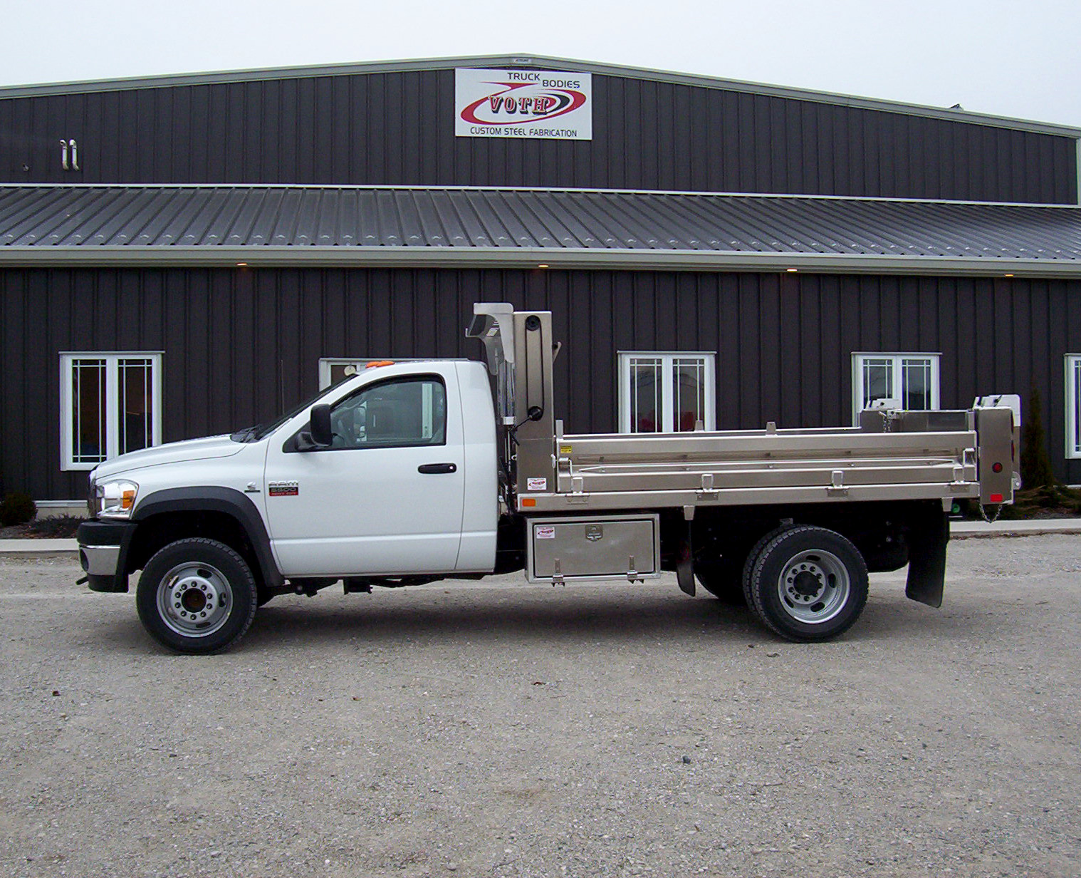 Side view of a truck in-front of the first dedicated Voth facility